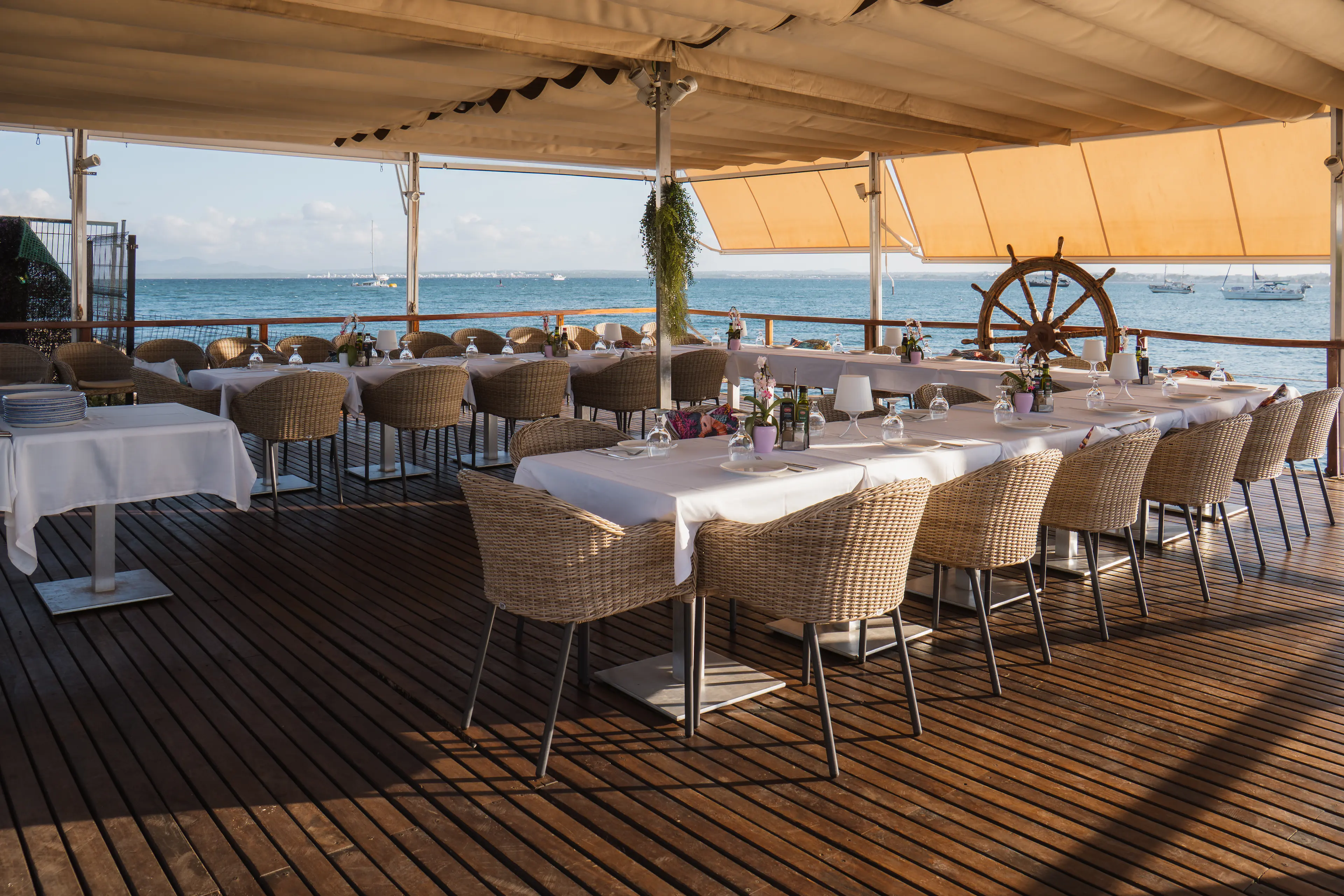 Aqua terrace at sunset with sea views